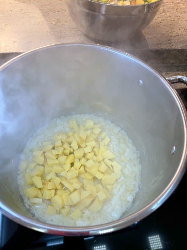 Fry the onions and potatoes